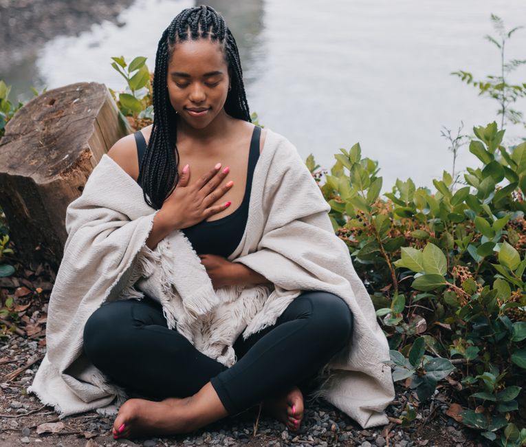 Student seated in a breathwork session